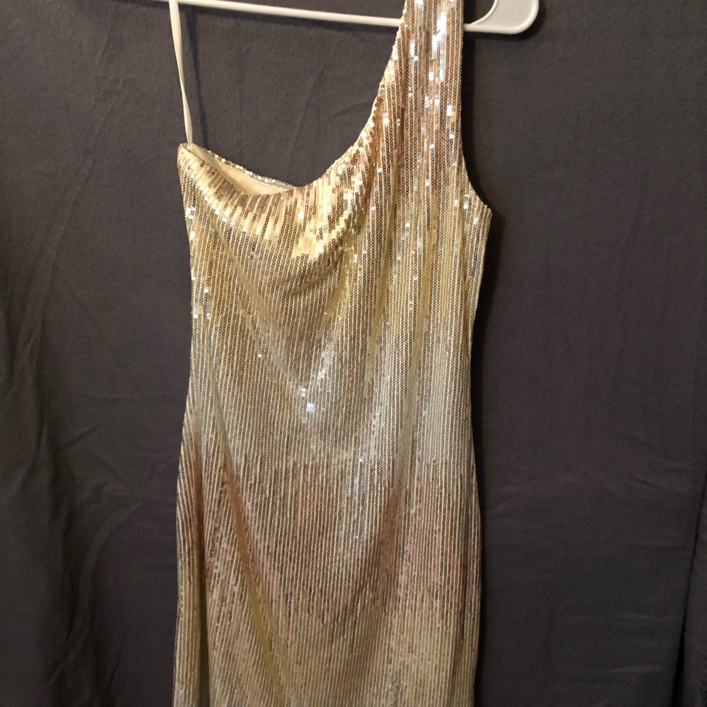 One shoulder sequin dress. 13
